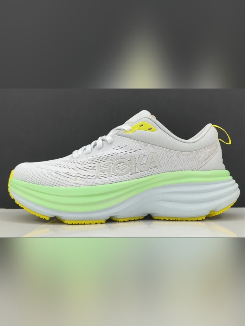Hoka Women's White Running Shoe with Neon Green & Yellow Accents